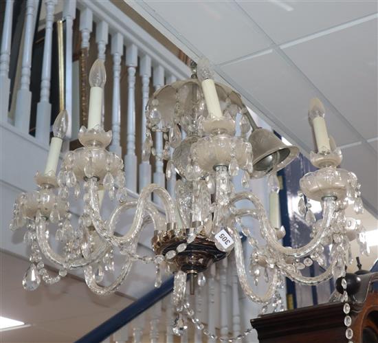 A cut glass eight-light chandelier (faults)